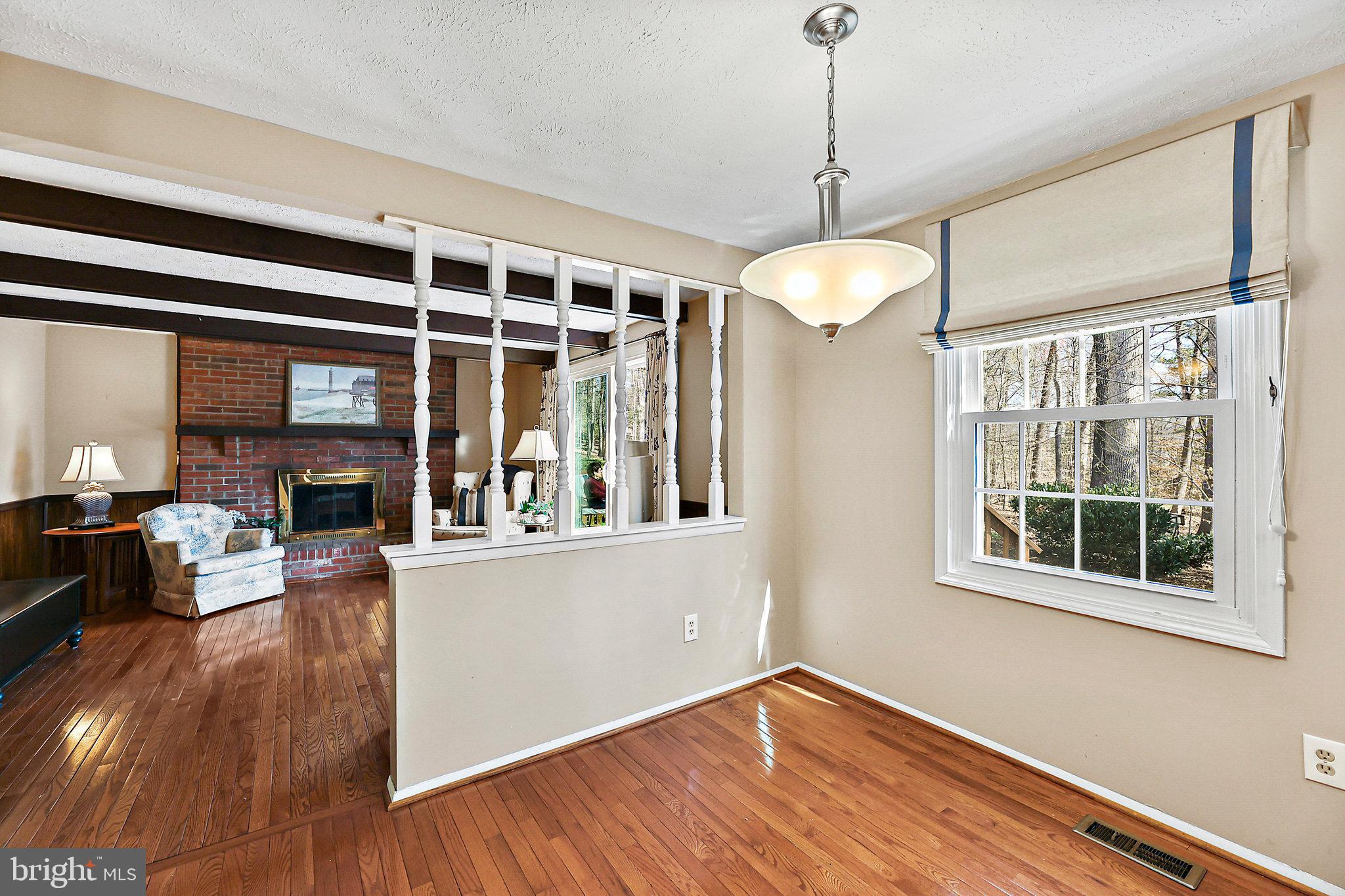 8470 Falling Leaf Road Springfield, VA 22153 - Photo 16 of 41 a view of a house with wooden floor and a window