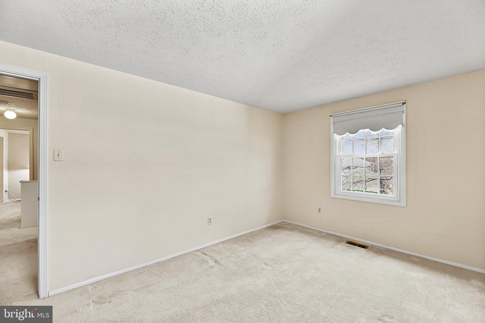 8470 Falling Leaf Road Springfield, VA 22153 - Photo 28 of 41 an empty room with a window