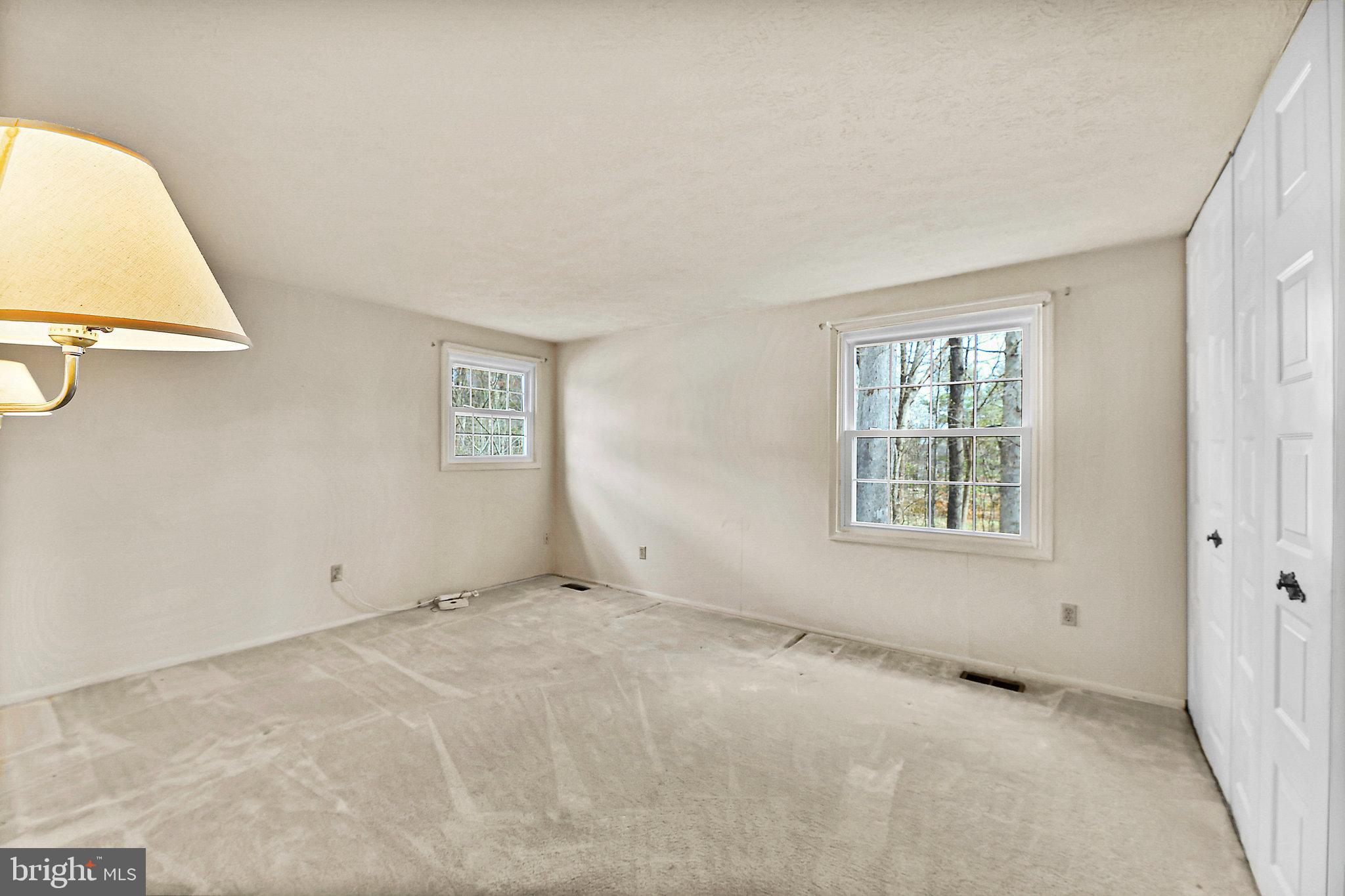 8470 Falling Leaf Road Springfield, VA 22153 - Photo 32 of 41 an empty room with windows
