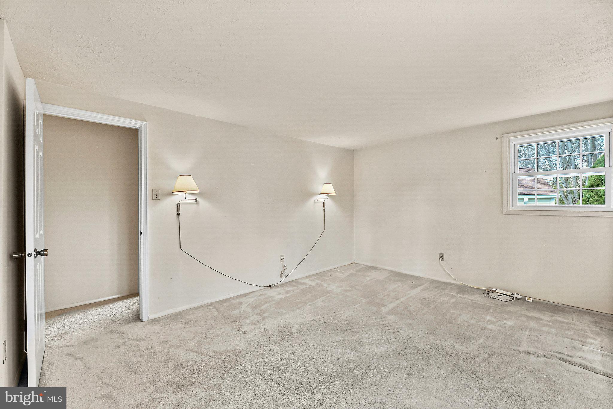 8470 Falling Leaf Road Springfield, VA 22153 - Photo 33 of 41 an empty room with a empty space and windows