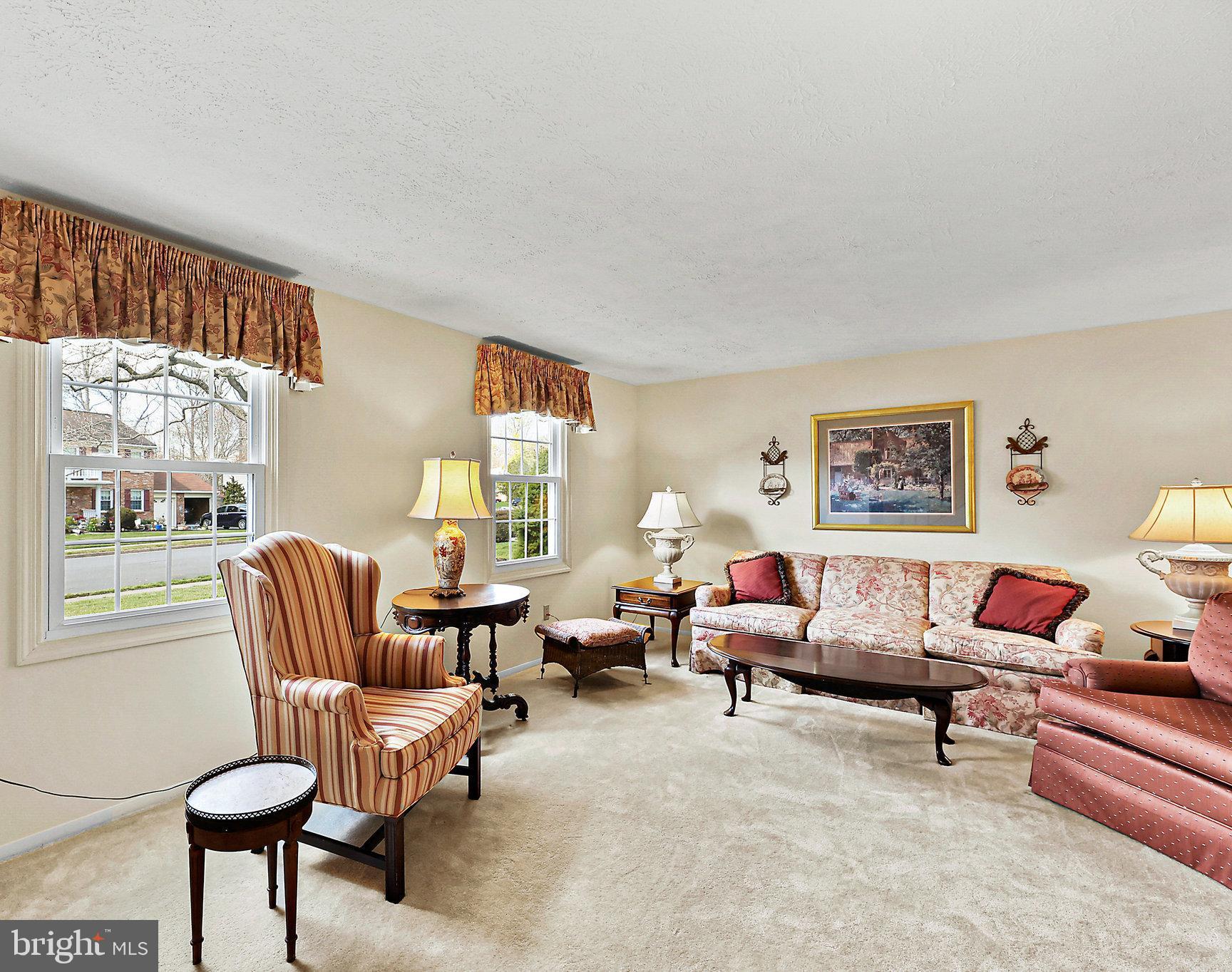 8470 Falling Leaf Road Springfield, VA 22153 - Photo 9 of 41 a living room with furniture and a large window