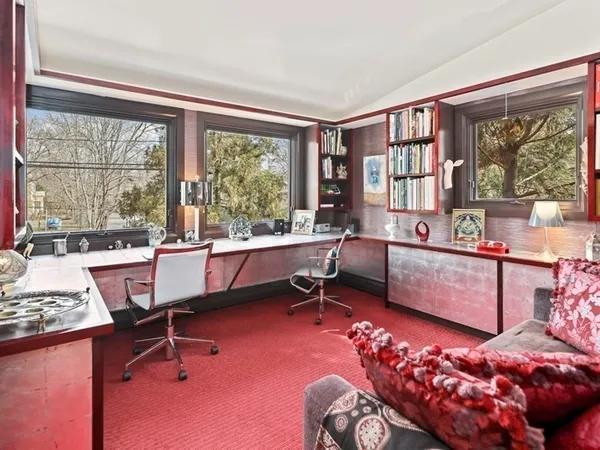 a room with furniture and a window