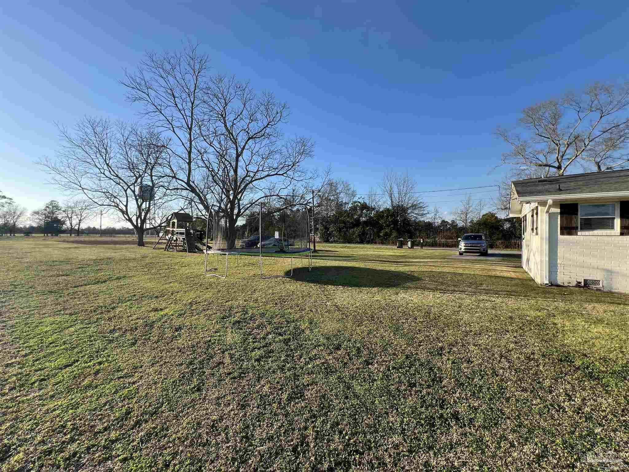 4075 Macks Road Century, FL 32535 - Photo 40 of 45 a view of yard with green space