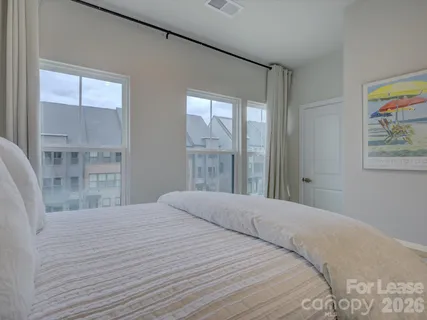 a bathroom with a shower and a bath tub
