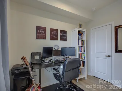a bathroom with a granite countertop sink toilet and bathtub