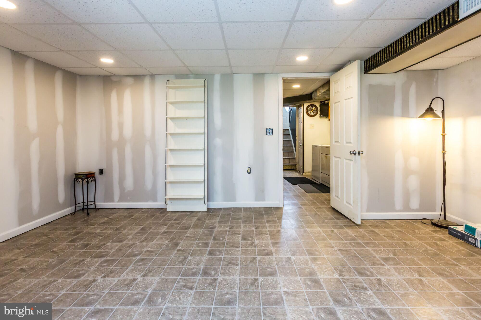 12235 Rambler Road Philadelphia, PA 19154 - Photo 16 of 25 Finished Walk Out Basement (Walls to be painted)
