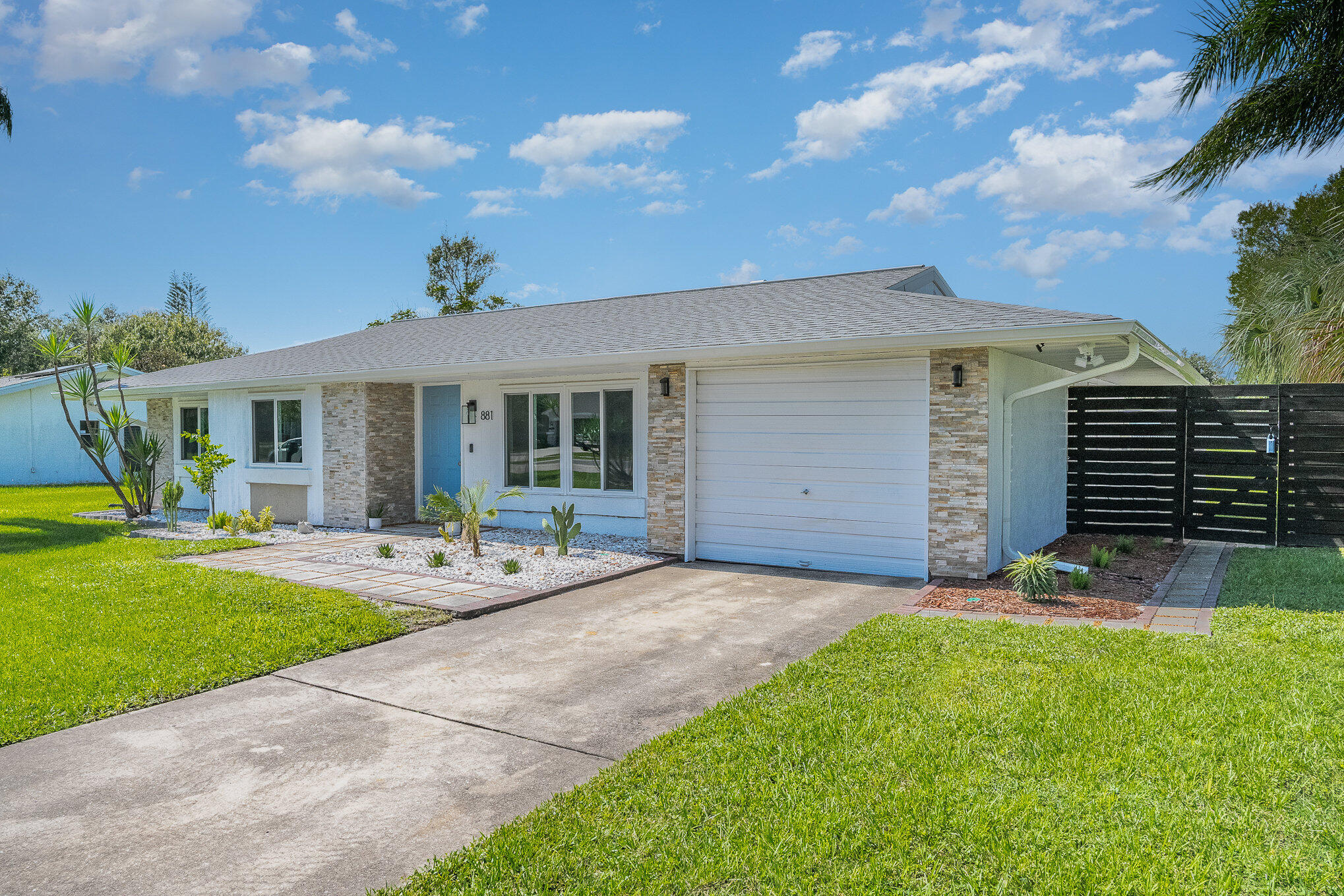 881 Riviera Drive Northeast Palm Bay, FL 32905 - Photo 2 of 35 Modern Coastal