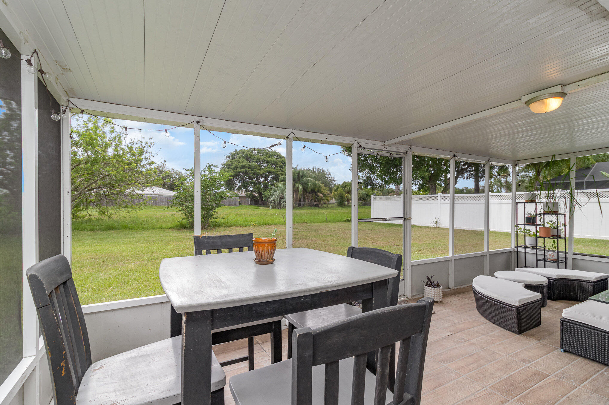 881 Riviera Drive Northeast Palm Bay, FL 32905 - Photo 23 of 35 Covered Lanai