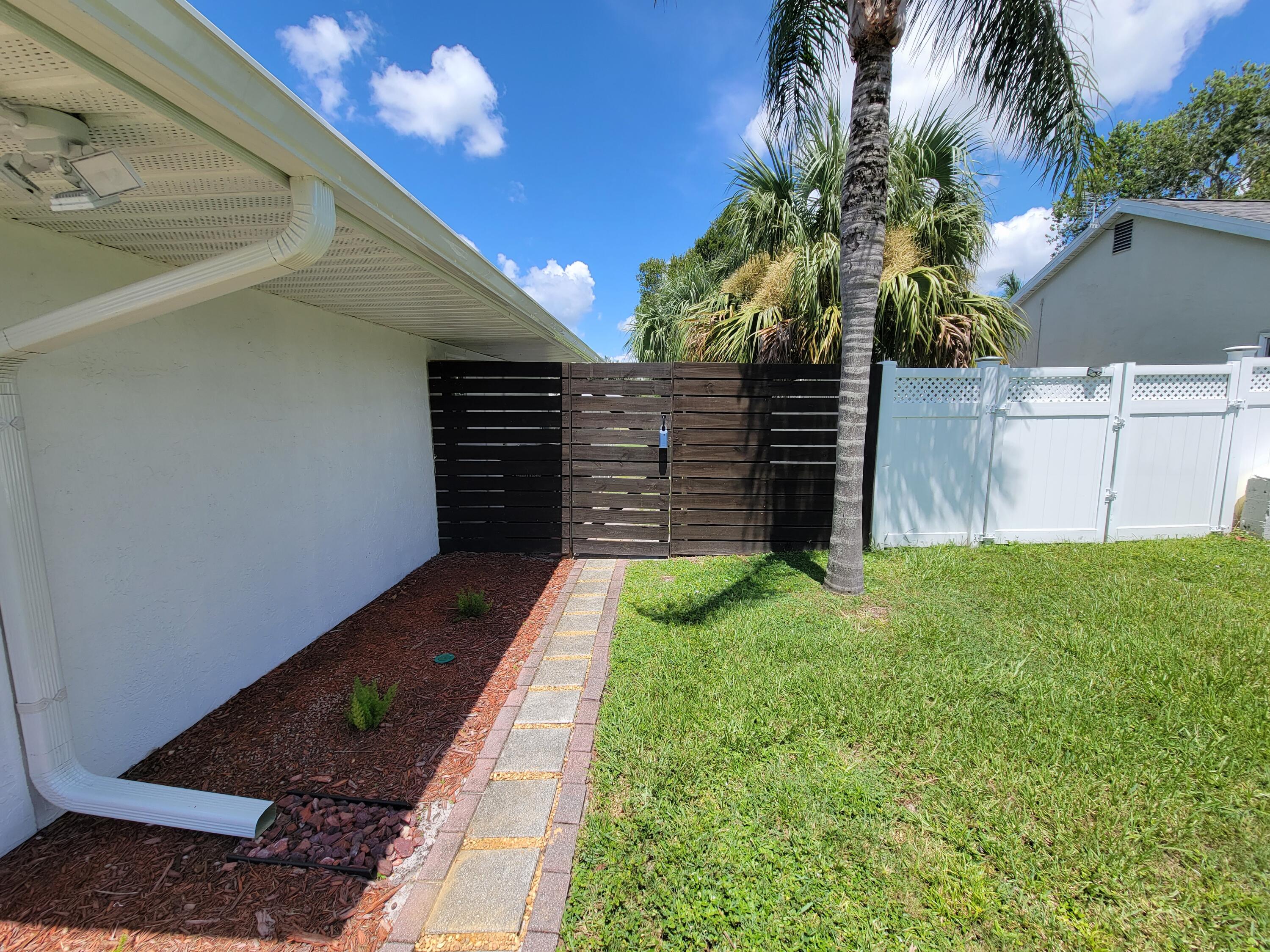 881 Riviera Drive Northeast Palm Bay, FL 32905 - Photo 25 of 35 Side Fence