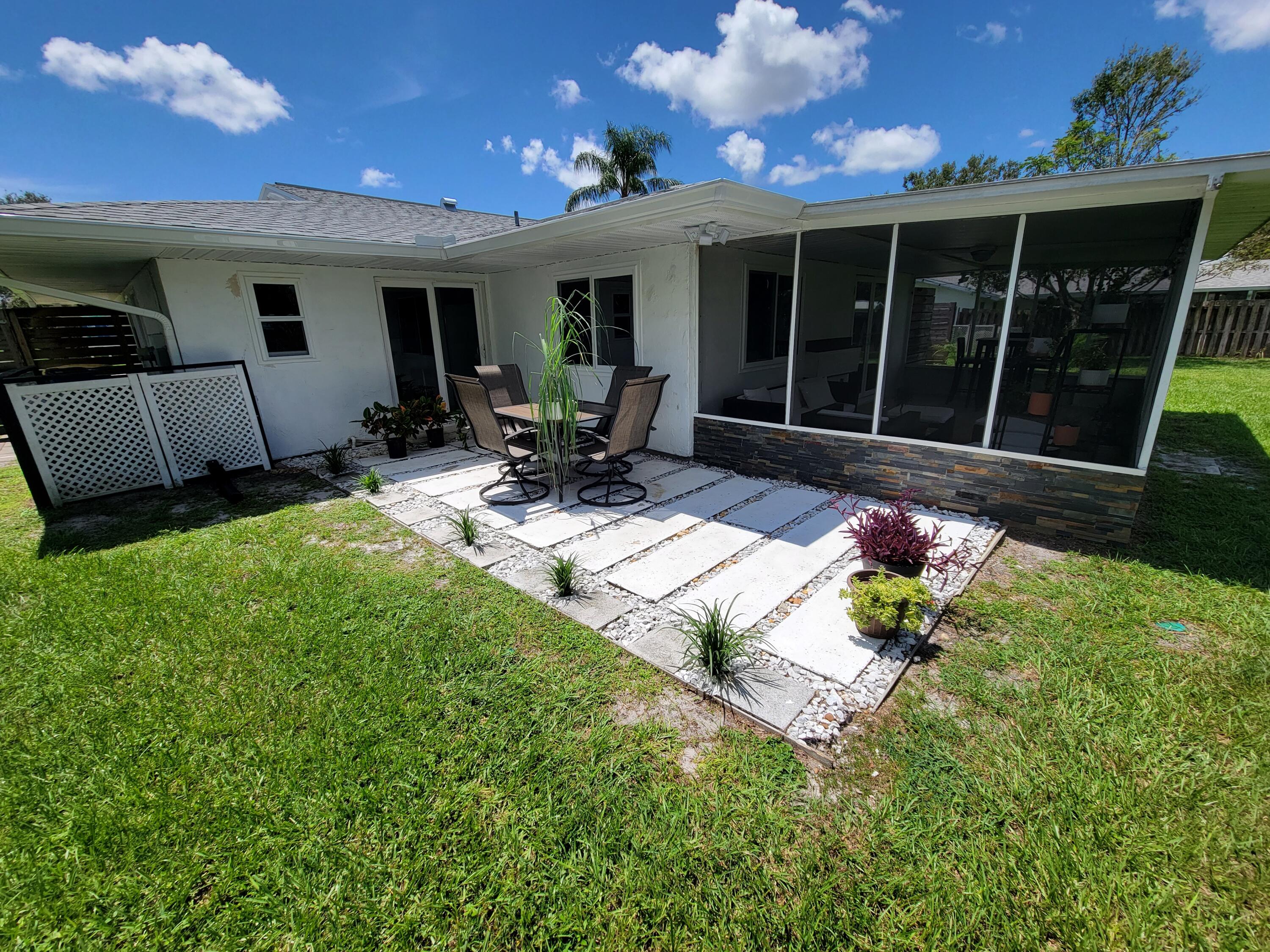 881 Riviera Drive Northeast Palm Bay, FL 32905 - Photo 29 of 35 Outdoor Dining
