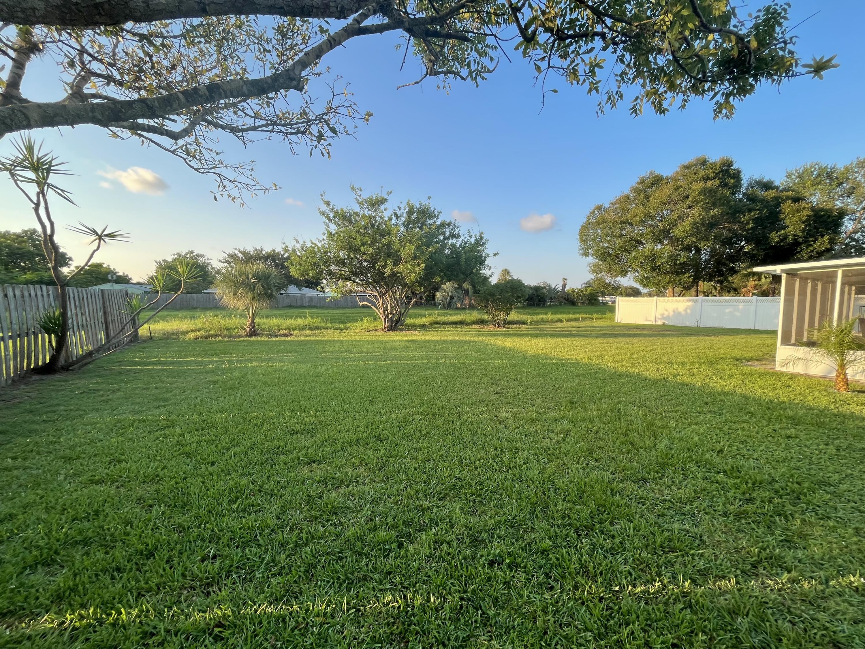 881 Riviera Drive Northeast Palm Bay, FL 32905 - Photo 30 of 35 LARGE Backyard