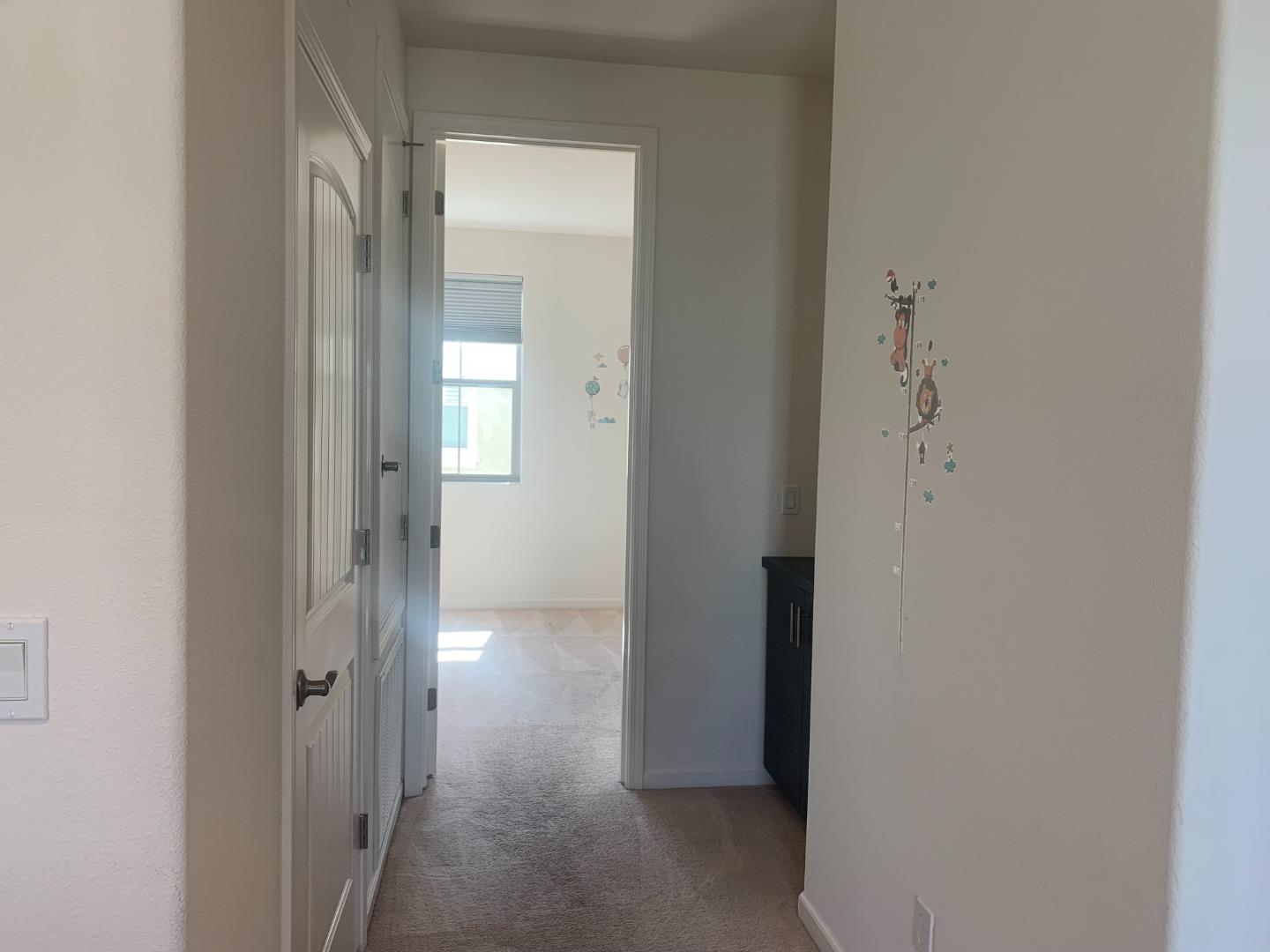 388 Expedition Lane Milpitas, CA 95035 - Photo 12 of 18 a view of a bathroom from a hallway