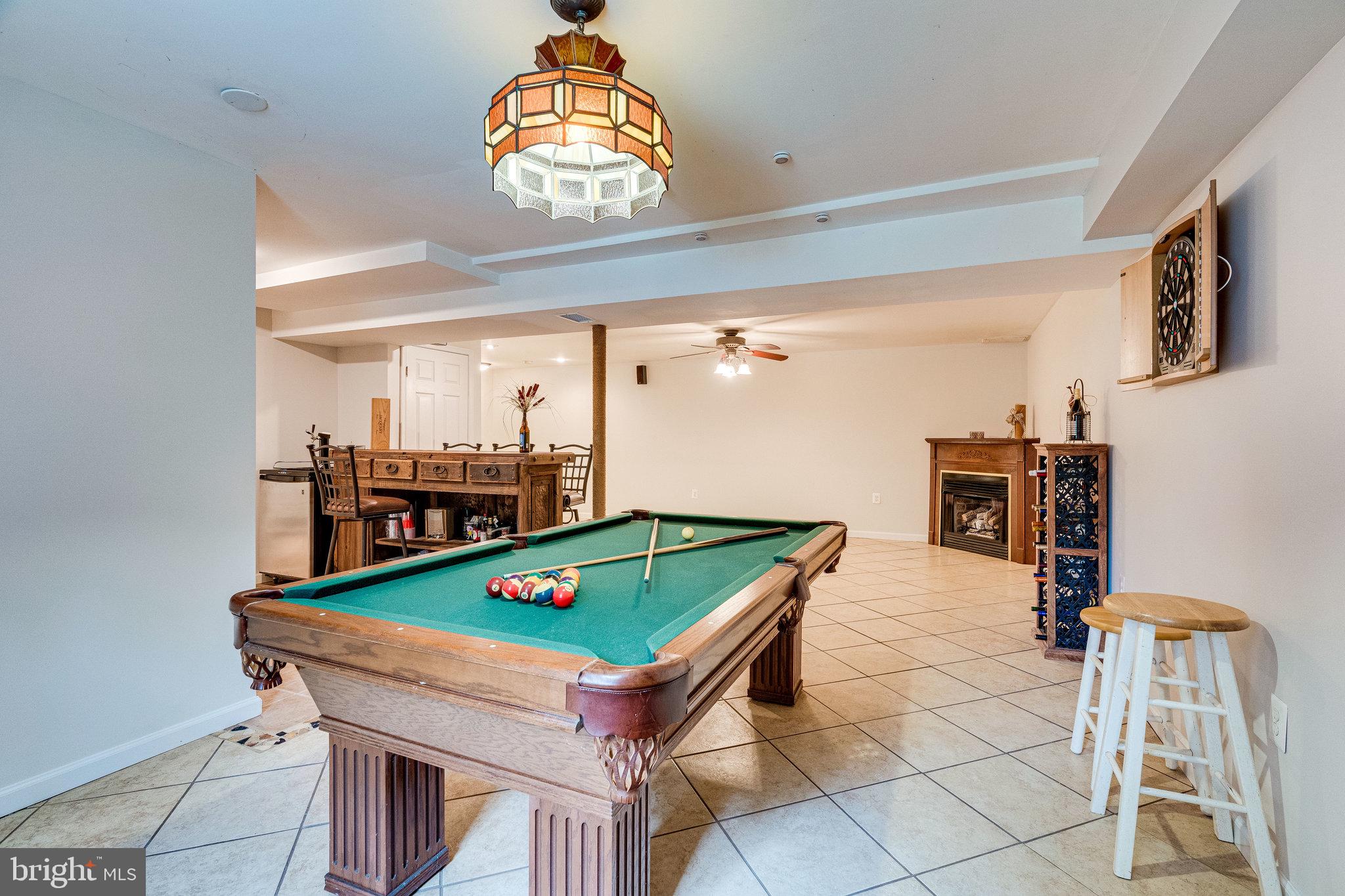 13221 Wates Spring Place Clifton, VA 20124 - Photo 35 of 68 Long view of Rec Room behind Billiard table