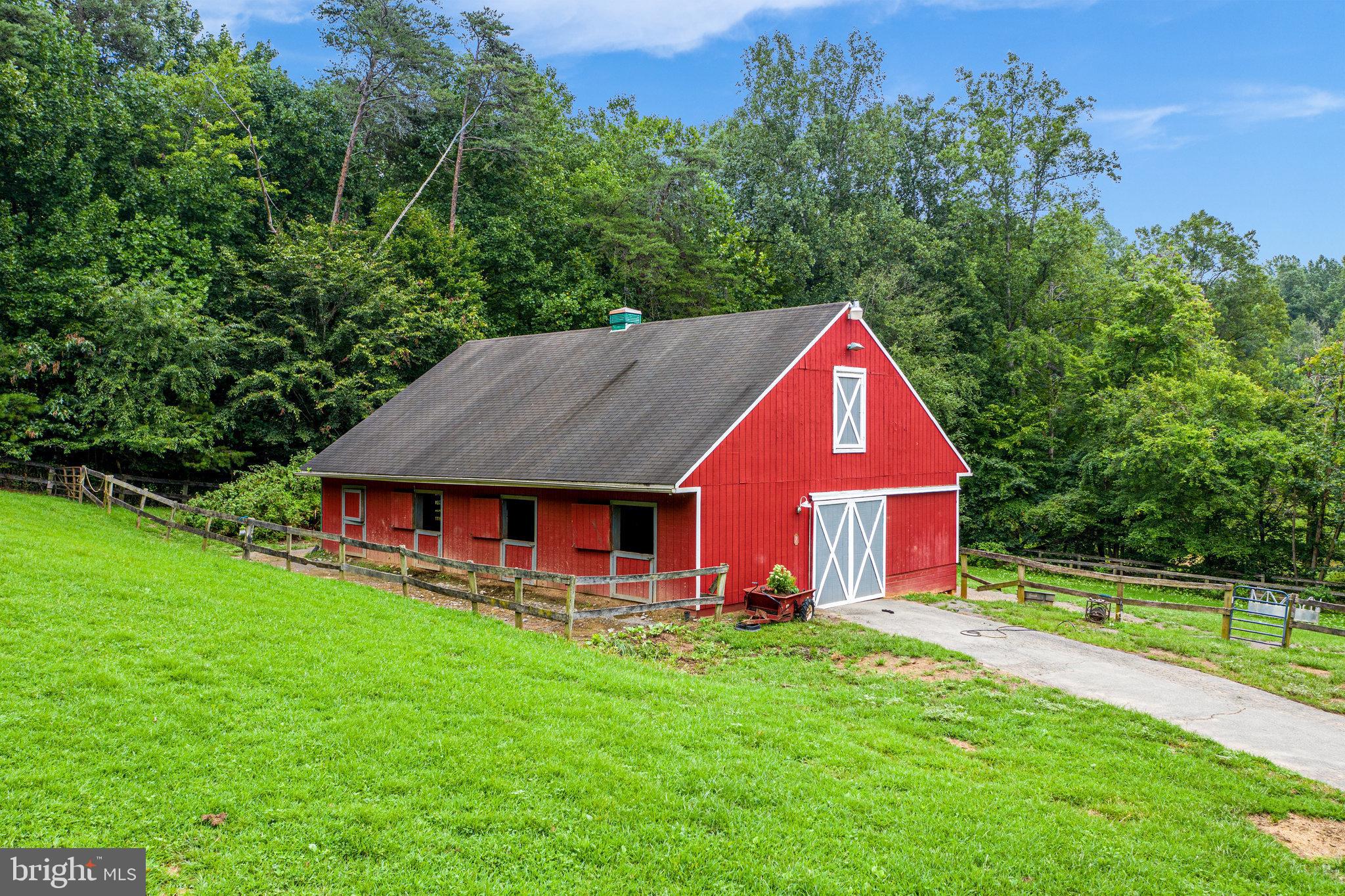 13221 Wates Spring Place Clifton, VA 20124 - Photo 56 of 68 7-stall center-aisle Barn awaits your horses!