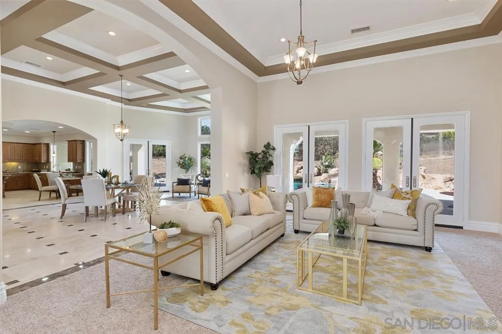 28310 Vía Santa Rosa Temecula, CA 92590 - Photo 12 of 23 a living room with furniture and a chandelier