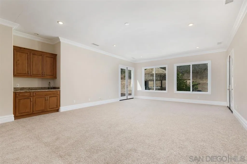 28310 Vía Santa Rosa Temecula, CA 92590 - Photo 15 of 23 a view of an empty room with a kitchen