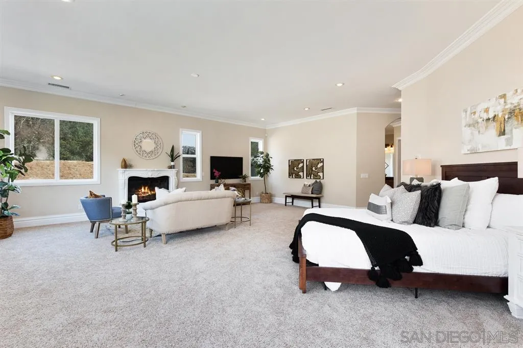 28310 Vía Santa Rosa Temecula, CA 92590 - Photo 17 of 23 a living room with furniture and a fireplace