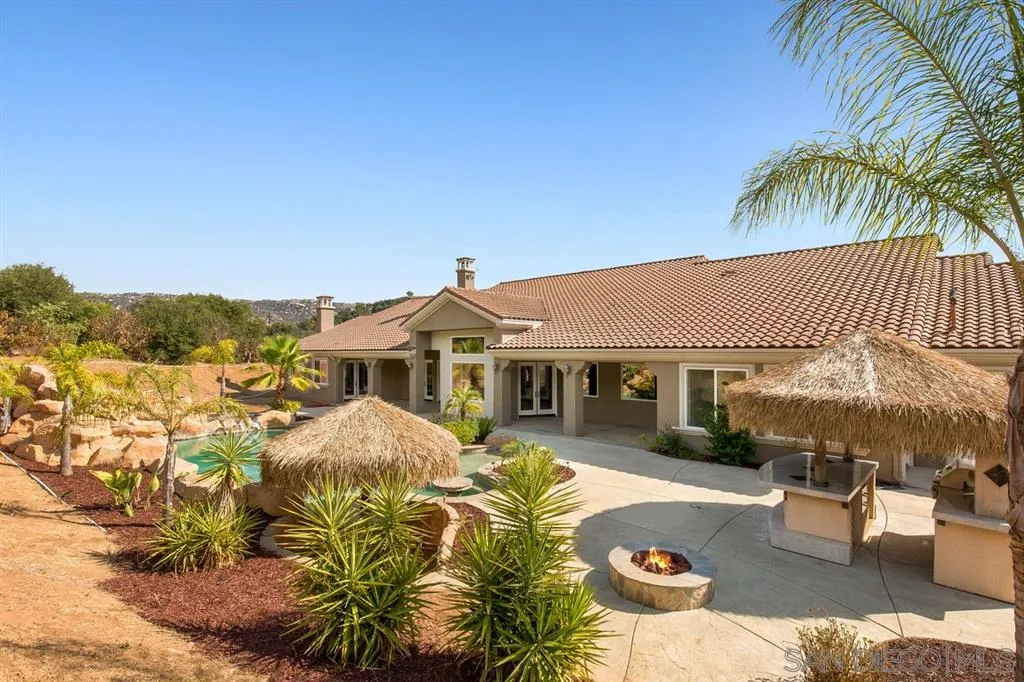 28310 Vía Santa Rosa Temecula, CA 92590 - Photo 22 of 23 a view of a house with swimming pool and sitting area