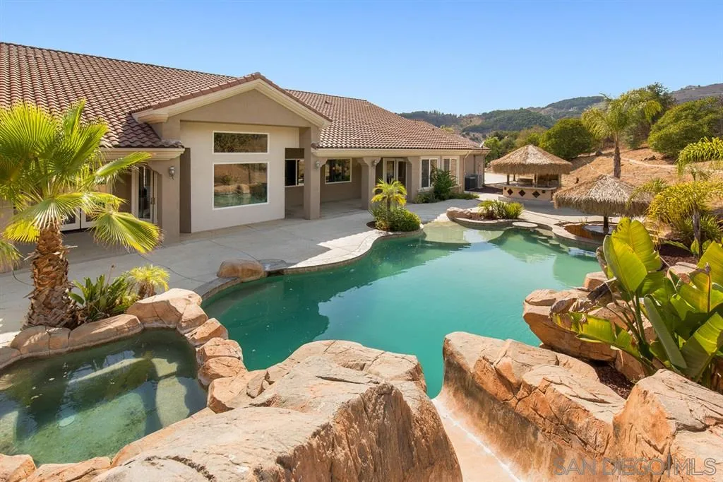 28310 Vía Santa Rosa Temecula, CA 92590 - Photo 3 of 23 a front view of a house with garden and porch