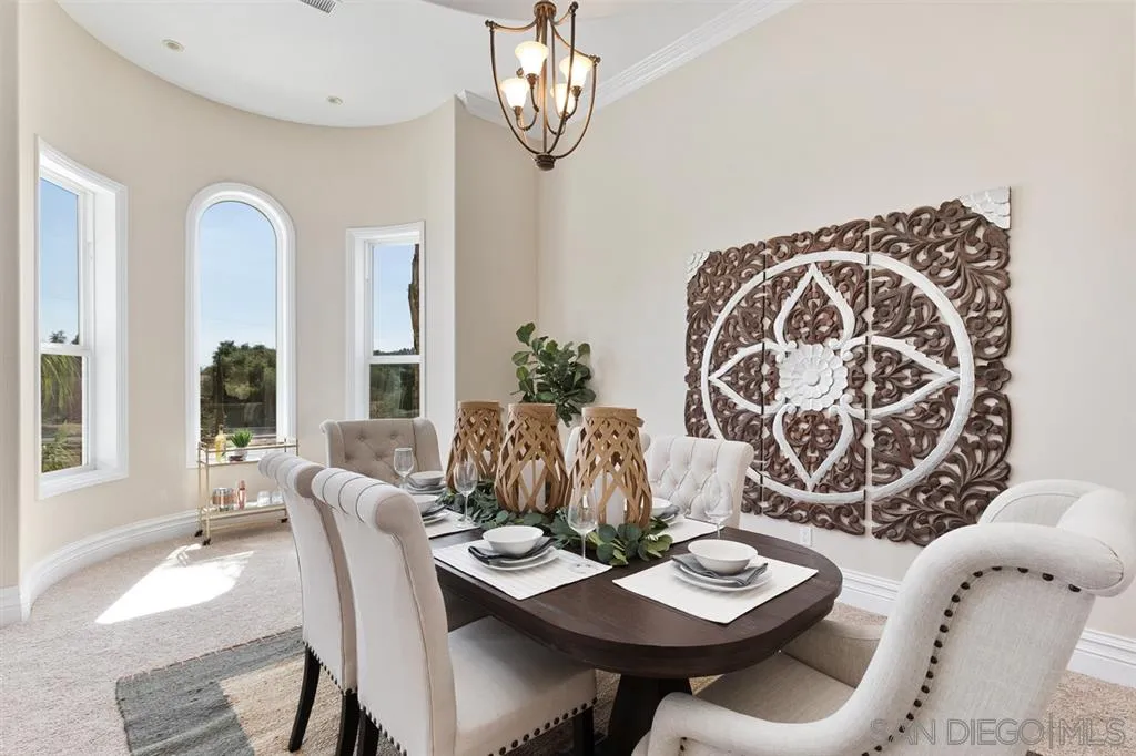 28310 Vía Santa Rosa Temecula, CA 92590 - Photo 9 of 23 a view of a dining room with furniture and wooden floor