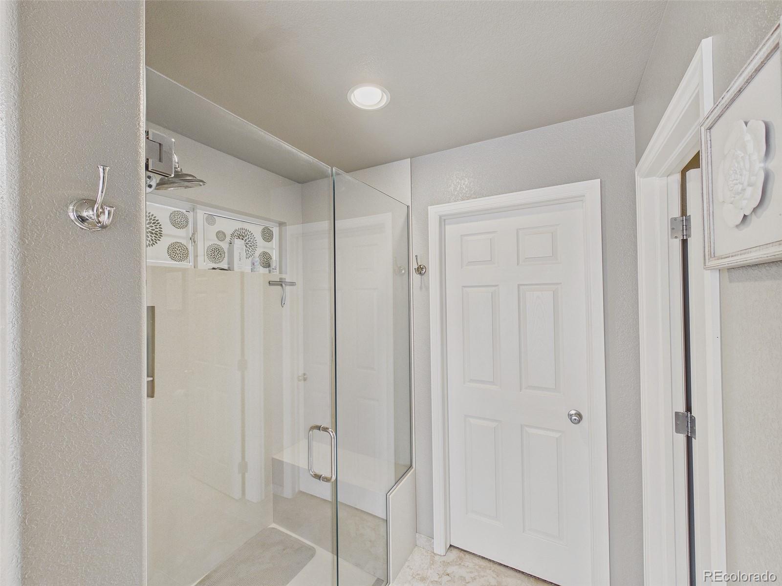 2805 South Jebel Way Aurora, CO 80013 - Photo 31 of 50 a view of a bathroom with a shower