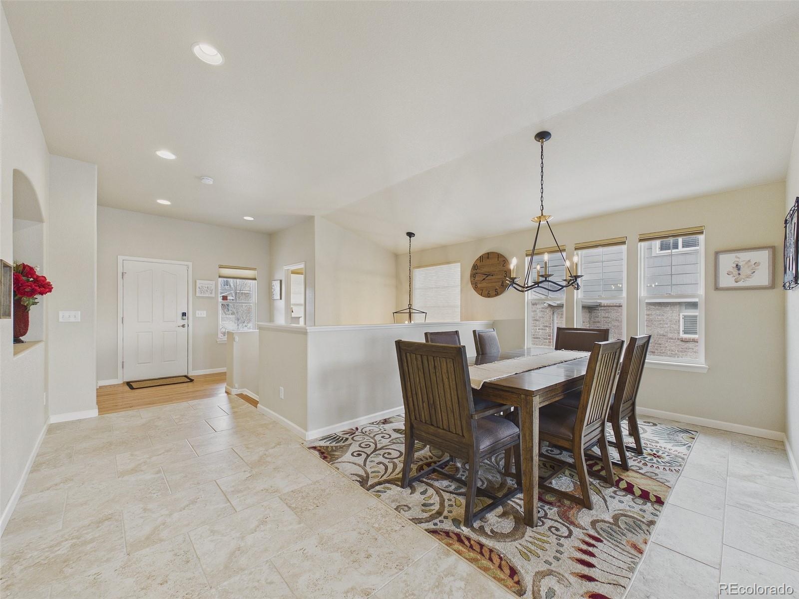 2805 South Jebel Way Aurora, CO 80013 - Photo 9 of 50 a view of a dining room with furniture