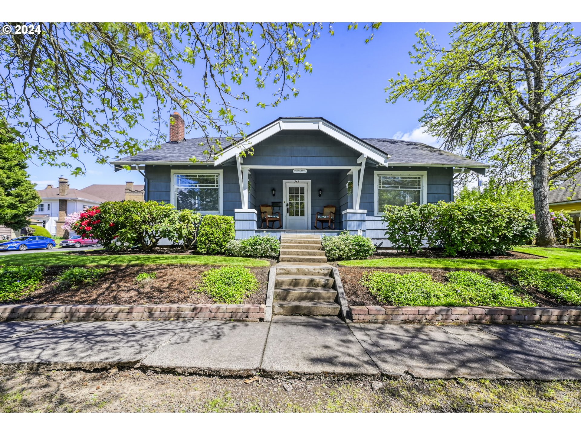 343 5th Street Springfield, OR 97477 - Photo 1 of 28 a front view of a house with garden