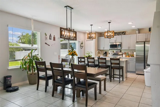 a view of a dining room with furniture