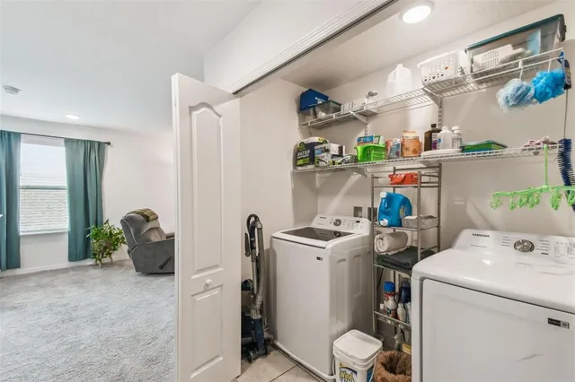 a view of a workspace with furniture