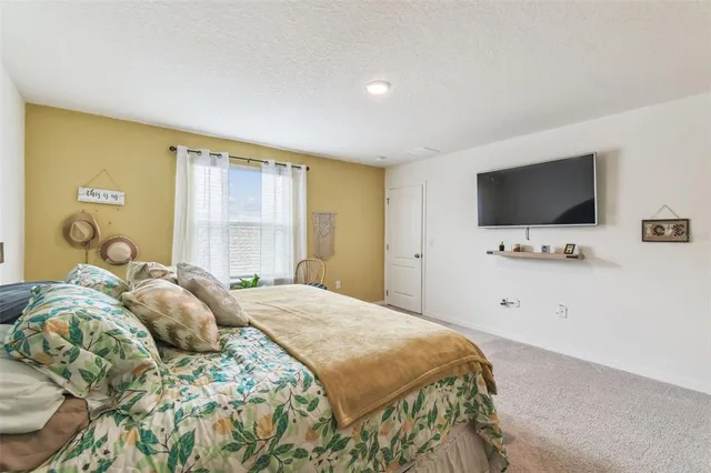 a bathroom with a sink and mirror with toilet