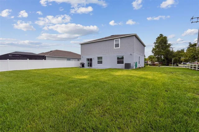 an aerial view of a house with a garden