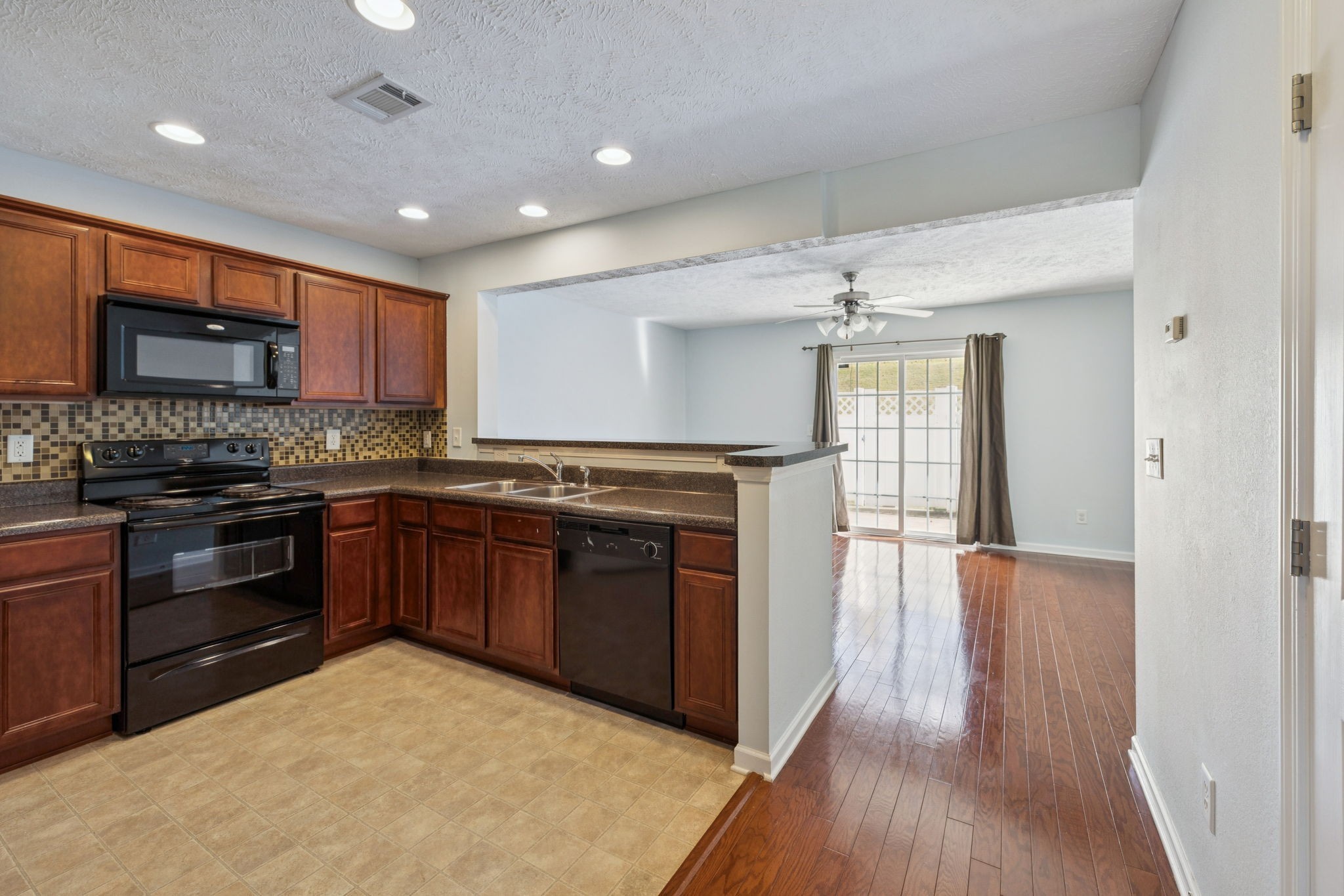 1841 Shaylin Loop Antioch, TN 37013 - Photo 1 of 27 a kitchen with stainless steel appliances granite countertop a stove and a sink