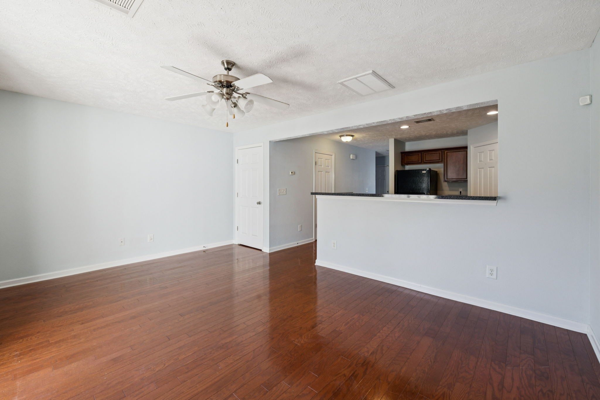 1841 Shaylin Loop Antioch, TN 37013 - Photo 13 of 27 an empty room with a empty space and a ceiling fan