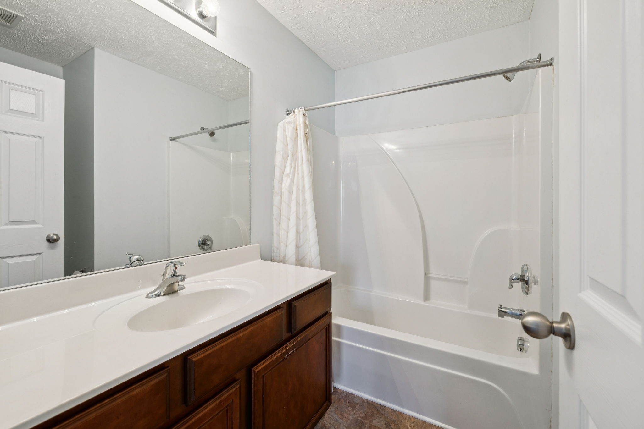 1841 Shaylin Loop Antioch, TN 37013 - Photo 18 of 27 a bathroom with a sink and a mirror