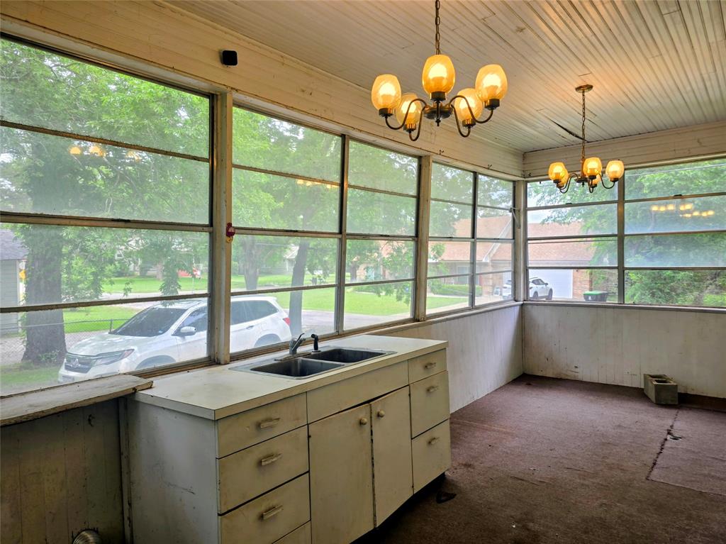 324 East Liberty Street Pilot Point, TX 76258 - Photo 21 of 22 Sunroom & entrance to basement