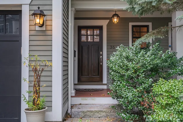 a front view of a house with a garage