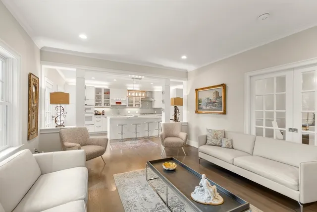 a living room with furniture and a table