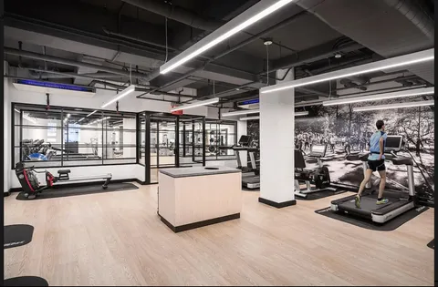 a view of a room with gym equipment