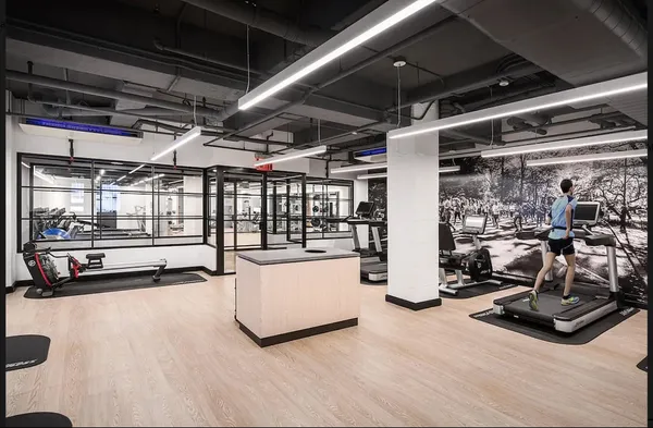 a view of a room with gym equipment