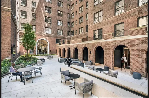 a group of chairs in front of building