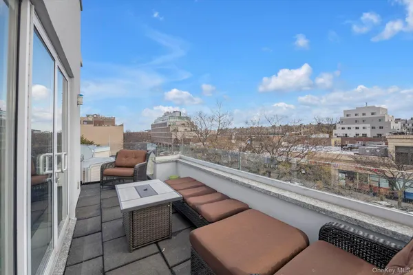 a view of roof deck with seating space