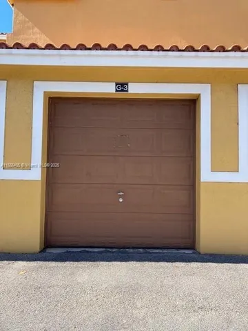 a view of an ocean with a mountain
