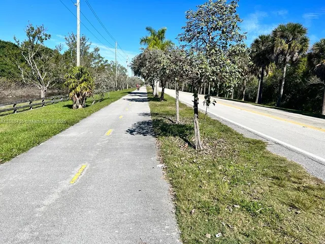 a view of a street with a building