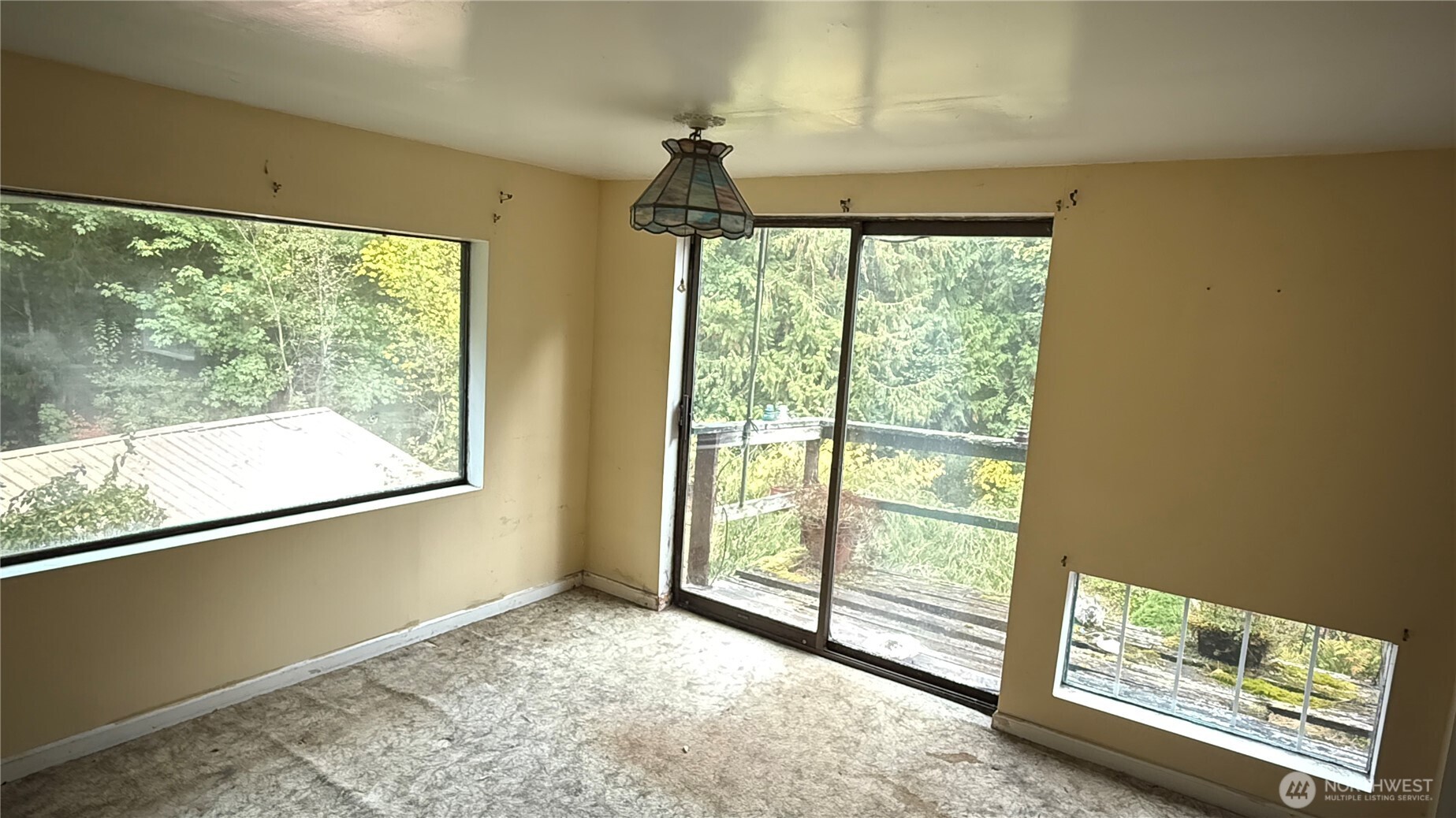 690 Naylor Creek Road Chimacum, WA 98325 - Photo 23 of 40 a view of an empty room with a window