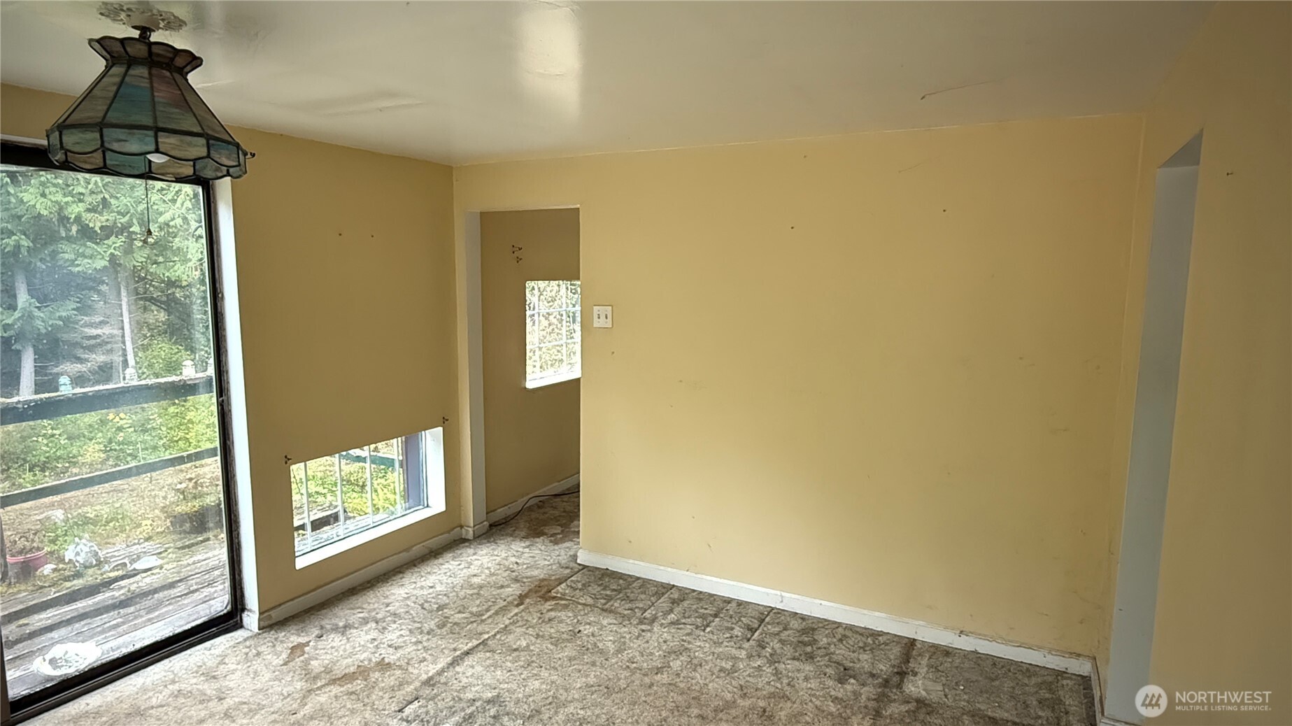 690 Naylor Creek Road Chimacum, WA 98325 - Photo 24 of 40 a view of an empty room and window