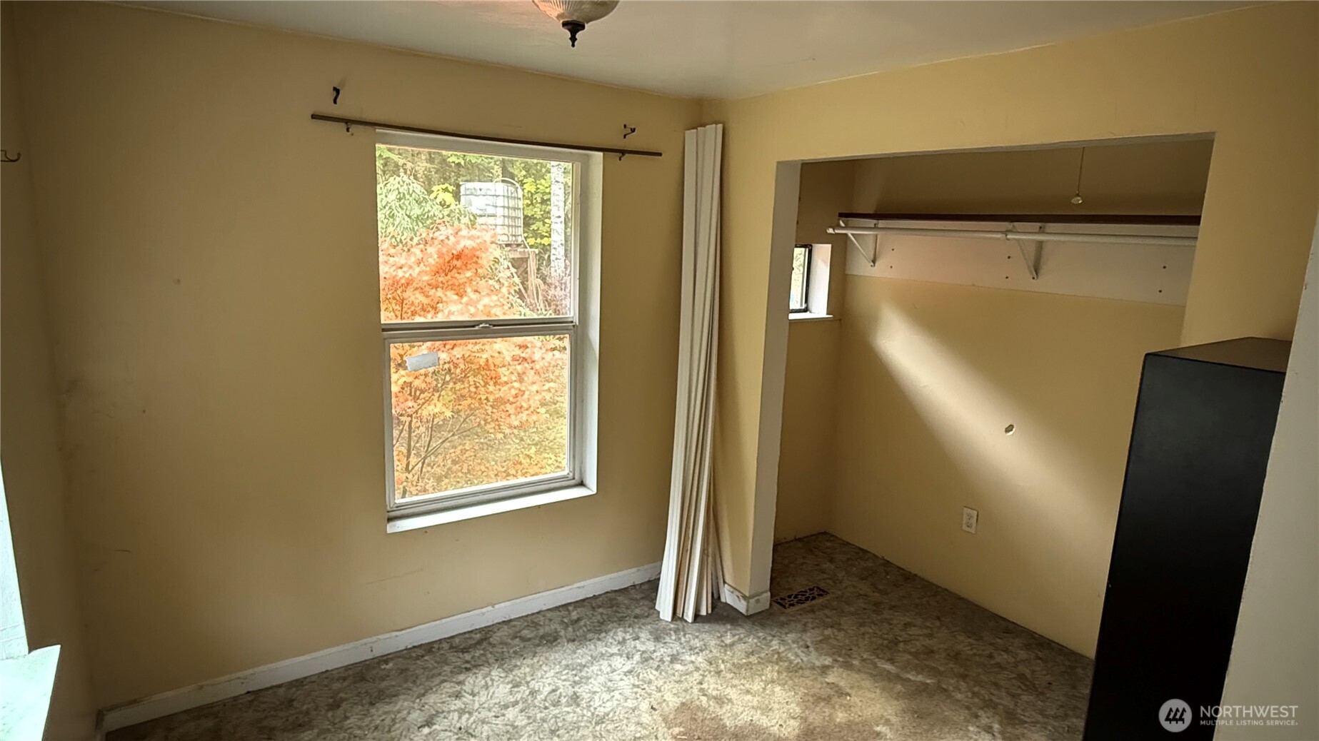 690 Naylor Creek Road Chimacum, WA 98325 - Photo 25 of 40 a view of an empty room with a window