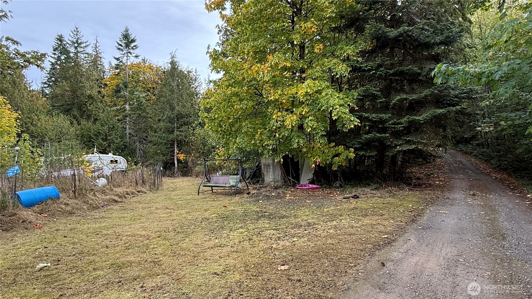 690 Naylor Creek Road Chimacum, WA 98325 - Photo 31 of 40 a view of a outdoor space with a house and sitting area