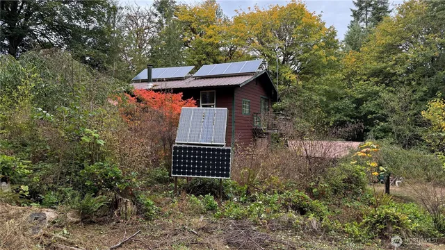 a backyard of a house with lots of green space