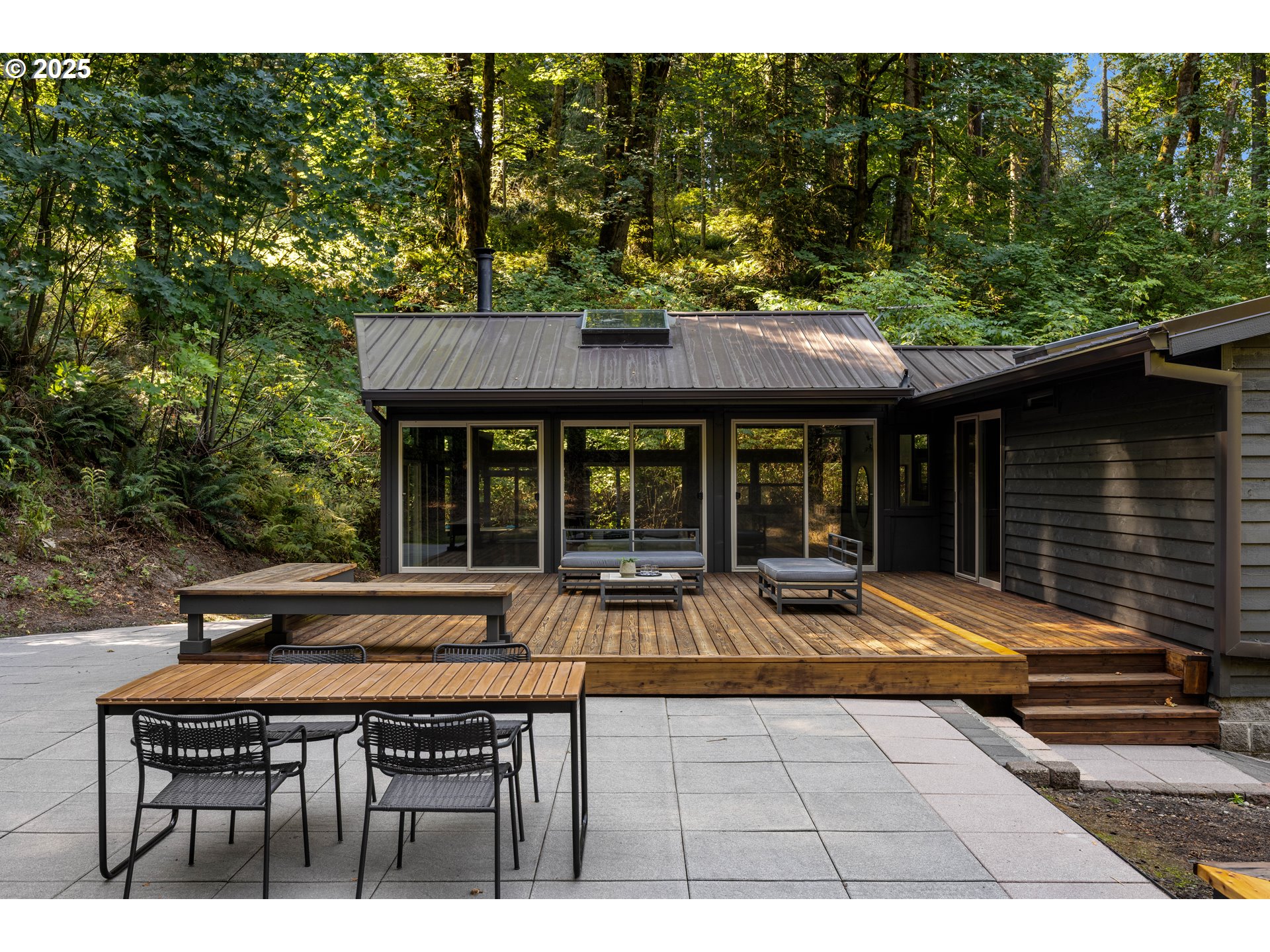 6125 Northwest Thompson Road Portland, OR 97210 - Photo 9 of 39 a house view with a seating space