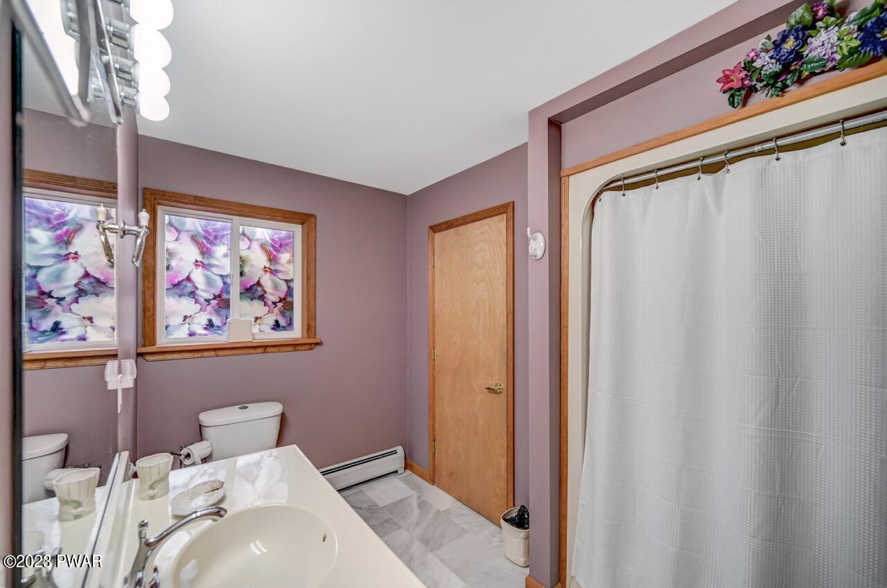 1294 Brookfield Road Lake Ariel, PA 18436 - Photo 26 of 75 a bedroom with a bed and furniture